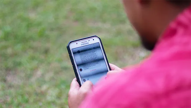 Person looking at a smart phone