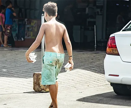 Child vendor on a street in Apia