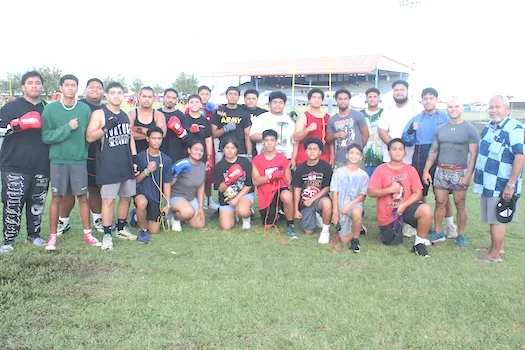 ASBA president and Coach Iakopo with boxers