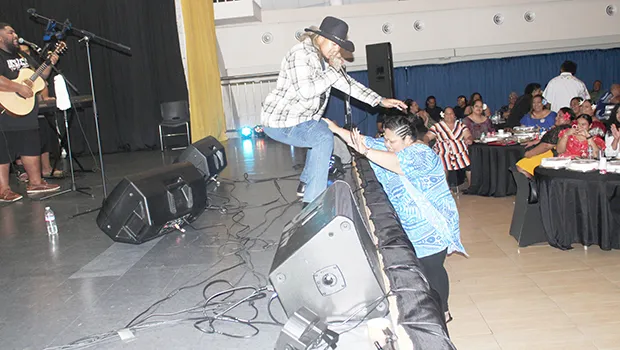 Mr. Cowboy — Sam Ah Chookoon and a fan 