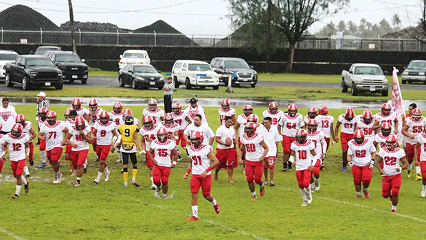 Faga’itua Vikings Football Team running towards the sidelines 