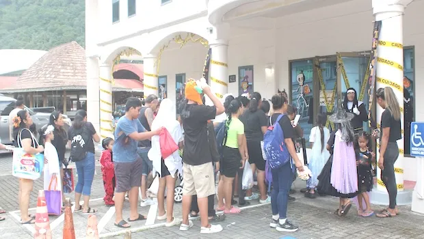 Halloween tricksters lined up outside the Jean P. Haydon Museum 