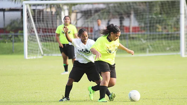 Juliana Radinikadavu (left) of Ilaoa & To’omata defends against Pago Youth’s Faafeu Amisone
