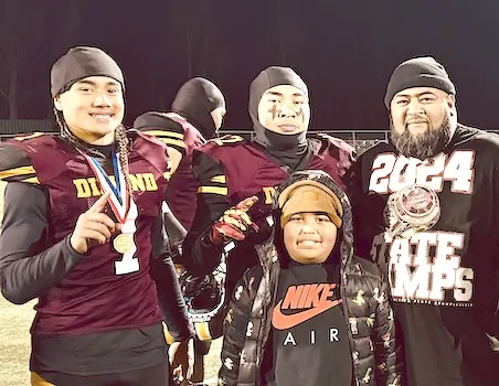 Lewis "Coach Saynt” Amituanai and family