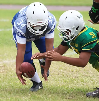 JPS Sharks punter trying to gain possession of a bad snap