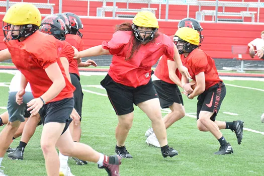 Bluffton junior Julia Mackenzie moves towards her block