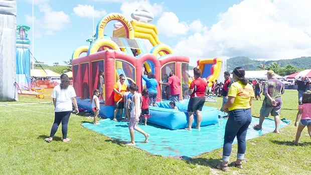Kids enjoying jumpers at Farm Fair