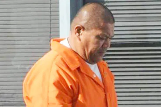 Former DPS officer Junior Utuga when he was first arrested in March of last year 