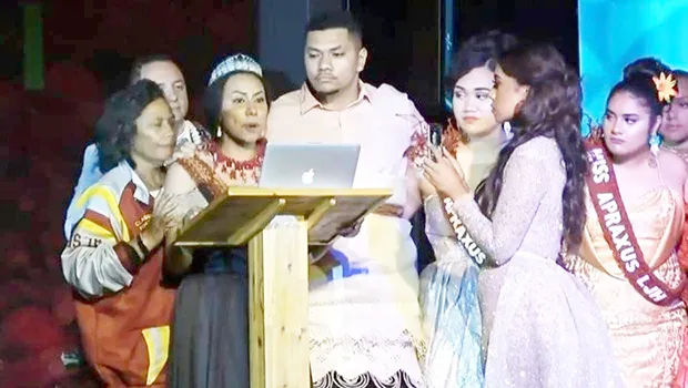 Kalo Funganitao during her speech surrounded by supporters