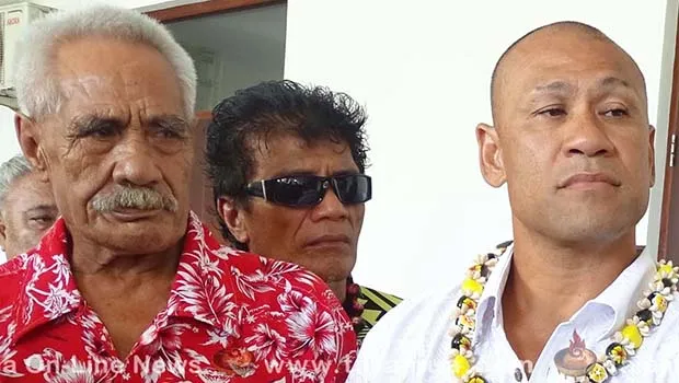 Paulo Malele or King Faipopo (in white shirt) who is charged for making false statements against the Prime Minister, with some of his supporters outside court