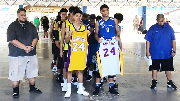 ASHSAA basketball players honoring Kobe Bryant