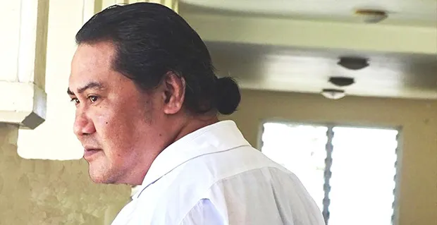 Kolani Junior Lam outside the courthouse in Samoa.