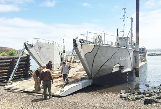 A landing craft being used for commercial purposes