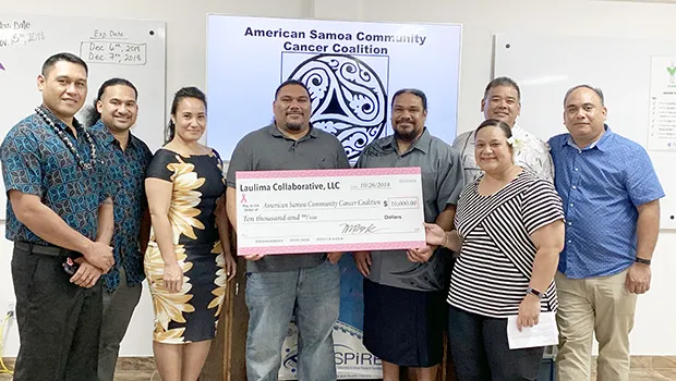 (L-R) Vai Semeatu, Iosefa Suani, Leka Bode, Uesele Suani, Fritz Suani, Si’itia Soliai-Lemsus, Troy Asuncion, and Va’atausili Tofaeono.  Not pictured: Colin Bode, Nu’usila Suani, Jr., and Harry “Pops” Asuncion.