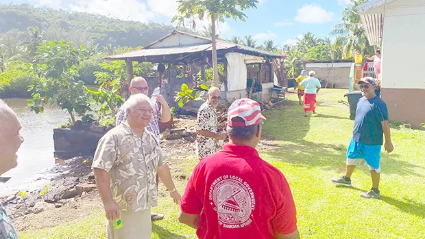 Leone chiefs inspecting homes in the village