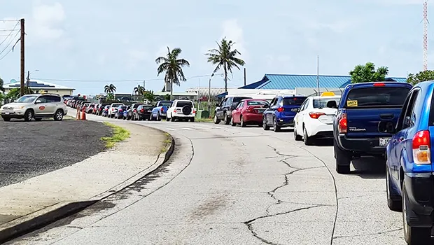 Vehicles lined up at Drive thru vax site