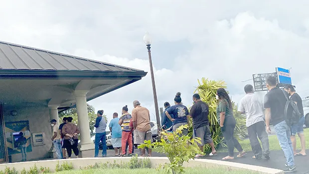 People in line at ATM