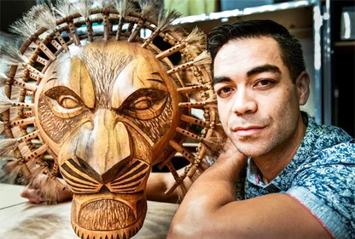 Gerald Ramsey, originally from the island of Aunu’u in American Samoa, with his Lion King mask