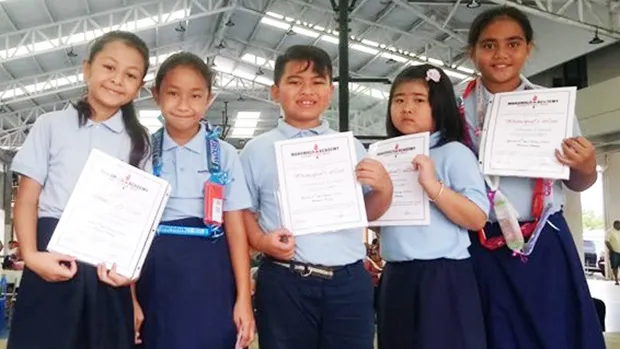 A group of bright third graders at Manumalo Academy