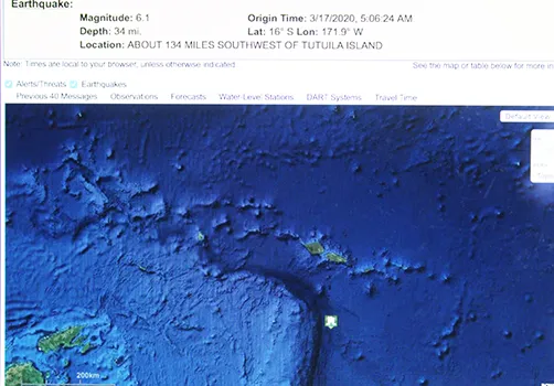 Screen shot of the US Tsunami Warning System website page, shows the location — the dot — of an earthquake with a preliminary magnitude of 6.1 