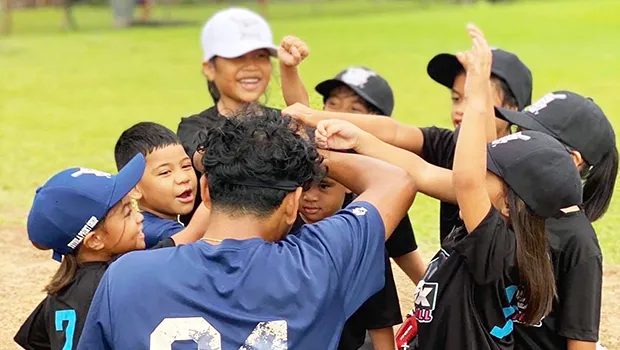 Little League TeeBall players with coach Paul Cassens-Hunkin