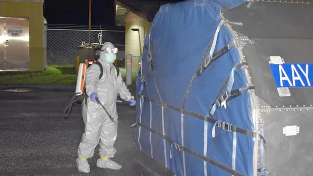 Spraying by EPA staff of mail and cargo