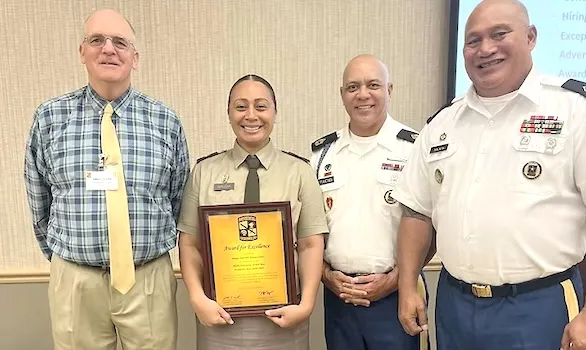 Major Siimoa Malaefono Galoia (2nd left) and Mark Allen Pratt (far left), 