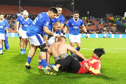 security guard tackles the fan