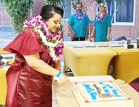 Ms. Marcella Fitisone CUTTING CAKE