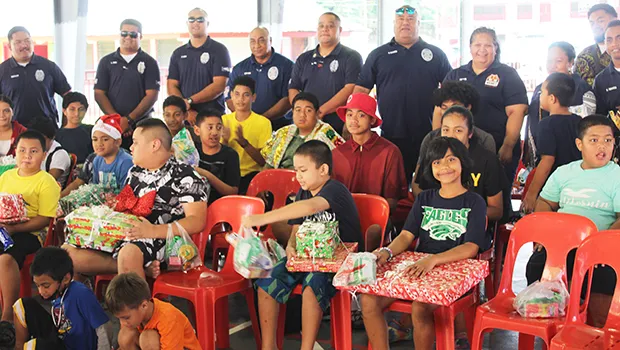 Marine Patrol members with Matafao students