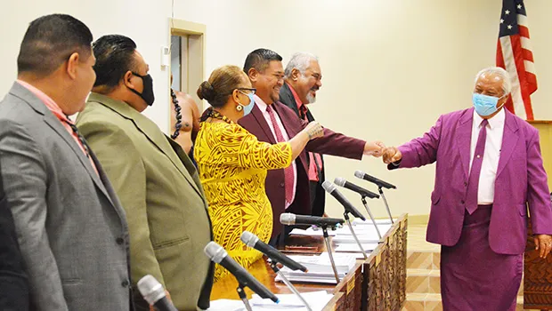 Faipule with and without face masks