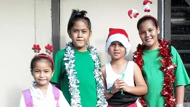 Matafao Elementary School students in their Christmas finery