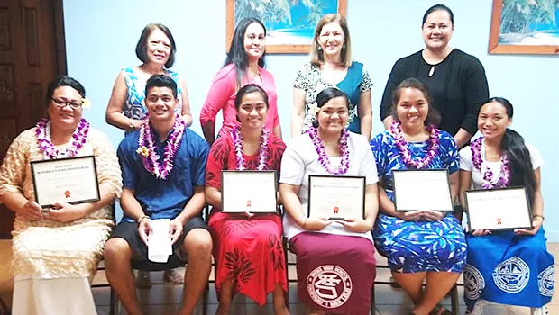 Chairwoman of the McDonald's American Samoa Scholarship Program, Dolores Tautolo (standing 2nd from left) with other the board members and scholarship recipients