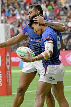 Tila Mealoi is hugged by David Afamasaga 