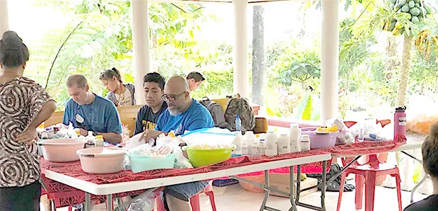One of the doctors and local volunteer, Duffy Hudson, during one of the clinics in independent Samoa