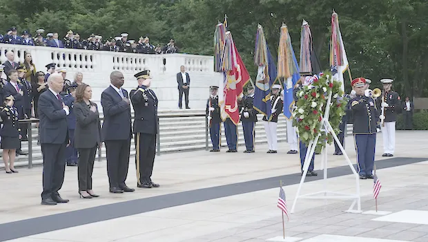 President Joe Biden, left, joined by, from left, Vice President Kamala Harris, Defense Secretary Lloyd Austin and Army Major Gen. Trevor Bradenkamp