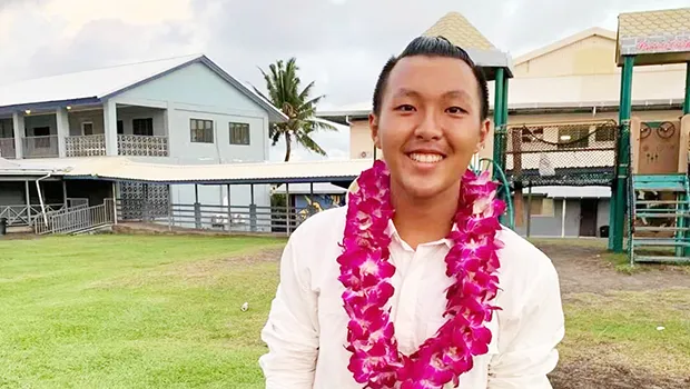 MICHAEL SUN IN FRONT OF SOUTH PACIFIC ACADEMY