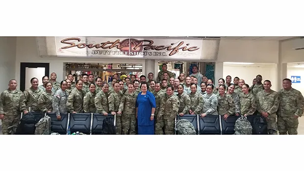 Amata with troops at airport