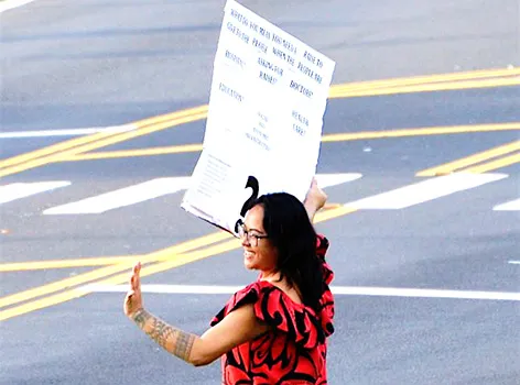 Moira Maiava protesting for better healthcare for American Samoa