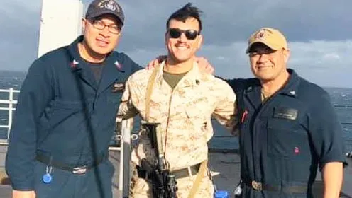 (l-r) ET1 (SW) Electronics Technician First Class Fiafia D. Sunia, SSgt Argiroudis Aristides, and MM3 (Machinists Mate Third Class) James Amuimuia