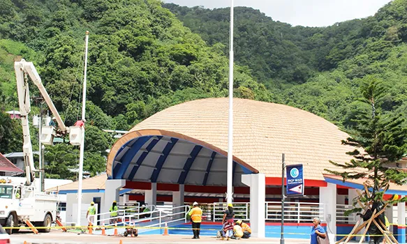 The refurbished Fagatogo Pavilion with the new flag poles in front.