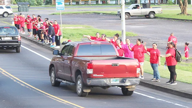 Some of the nurses and their supporters waiving yesterday morning in front of Fagaalu Park