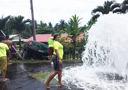 Fire hydrant spewing water