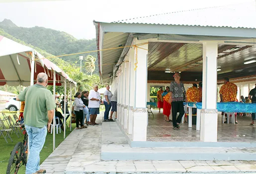 Electors stand in line outside while others were inside the Nu’uuli polling station