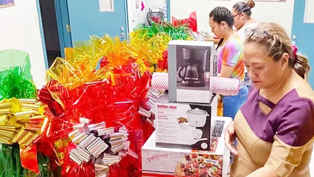 Office of Disaster Assistance and Petroleum Management staff wrapping presents