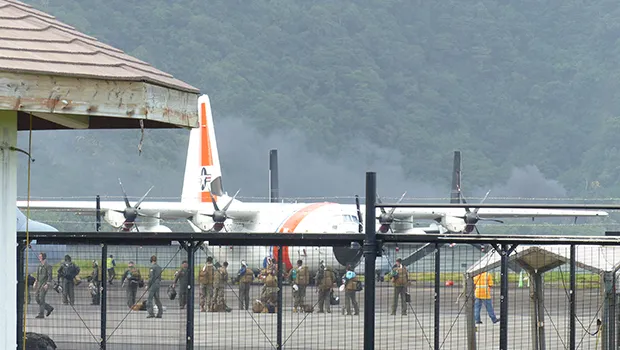 People deplaning uscg plane