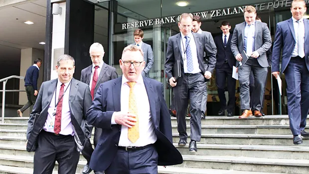 Adrian Orr and others on steps of Reserve Bank of New Zealand