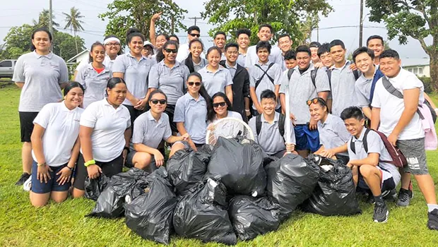 Manumalo Academy students with bags of rubbish collected from Pala Lagoon area
