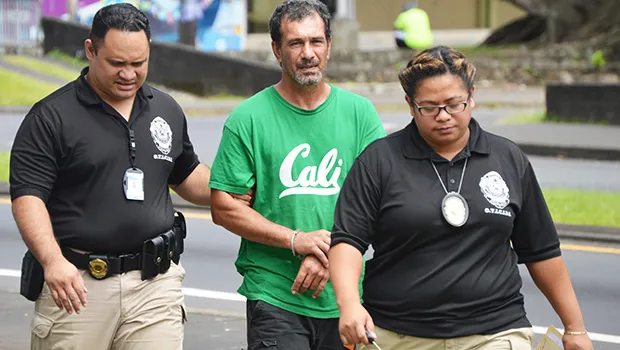 Paul Harman being taken into custody in American Samoa in Nov of this year.