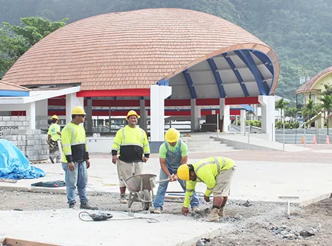 Crew members of Pentagon Construction seen last Saturday morning working on the front section of the Fagatogo Pavilion, which is set to be dedicated on Aug. 30th during the annual Workforce Day, sponsored by the local government.  The project comprises the renovation and extension of the Fagatogo Pavilion
